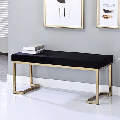 Banc contemporain pour chambre avec siège rembourré noir et structure en métal doré champagne