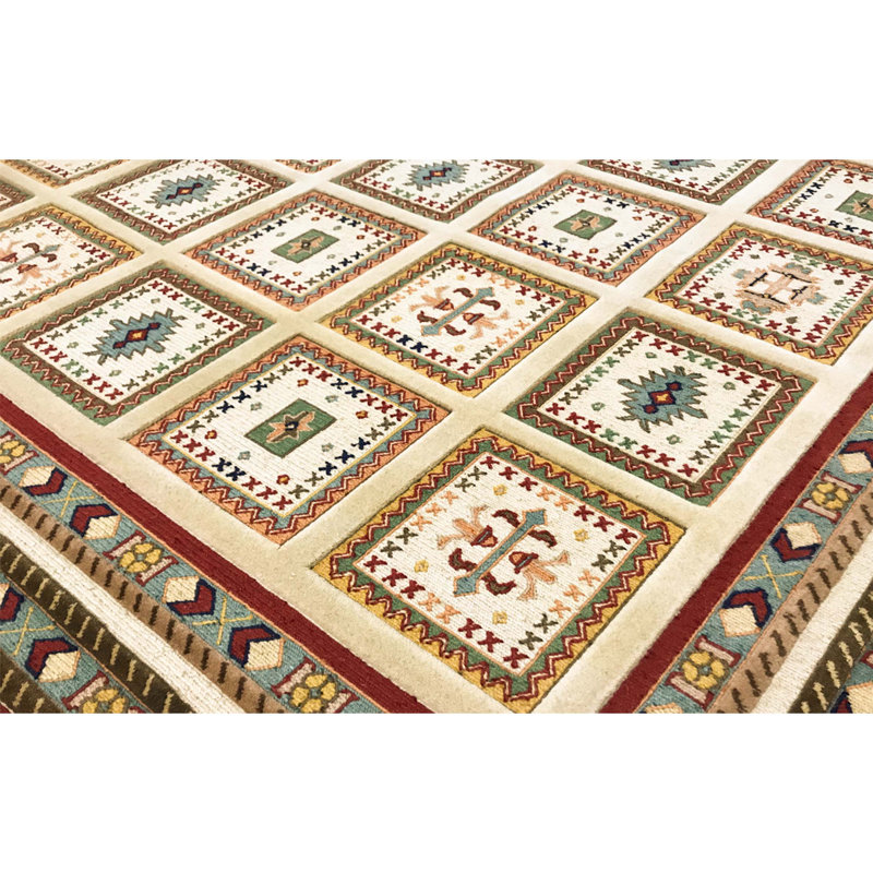 Tapis ivoire noué à la main de haute qualité