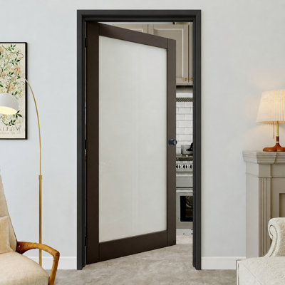 Porte prémontée noire à un vantail (81 x 203 cm) avec chambranle noir, vitrage intérieur dépoli, charnières noires, vitrage opaque, âme pleine insonorisée et étanche, idéale pour buanderie, placard ou chambre, ouverture à gauche.