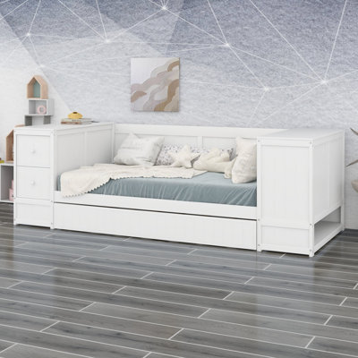 Daybed with storage arms, trundle and charging station keeps guest rooms organized and ready