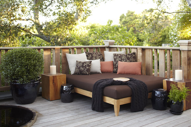 DIY back deck with chaise lounge and plants