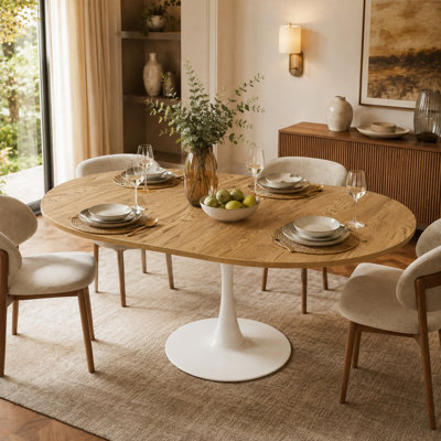 Table de salle à manger extensible Vonnie (107-147 cm), ronde ou ovale, pour 4 à 6 personnes, style tulipe moderne, plateau en MDF et piètement en métal.