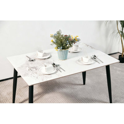 Modern Minimalist Dining Table with Quartz Top and Sleek Metal Legs
