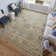 Caelinn Wool Floral Area Rug