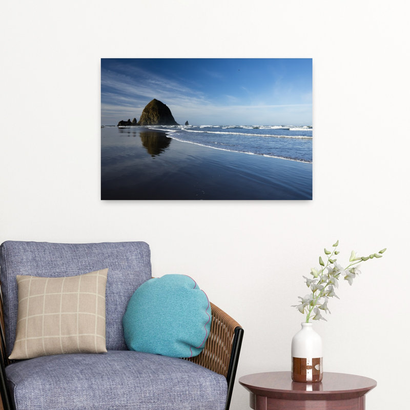 View Of Rock Formations Close To Coastline Cannon Beach Oregon USA by Dan Merkel - Wrapped Canvas Print
