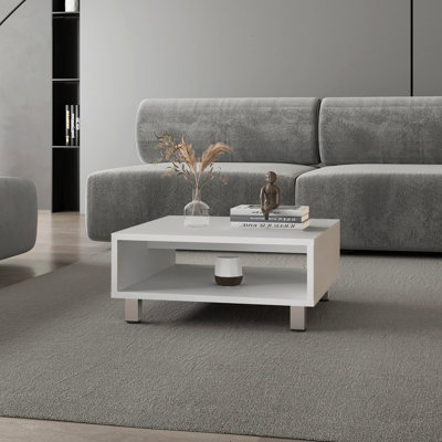 Table basse blanche avec rangement ouvert