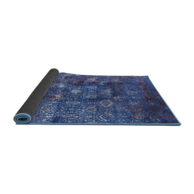 Tapis bleu / rouge Hutter, Rond 5 pi