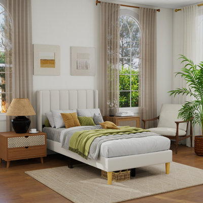 Sutter Upholstered Wingback Bed