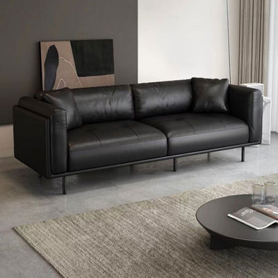 Causeuse-coussin modulable noire en cuir véritable