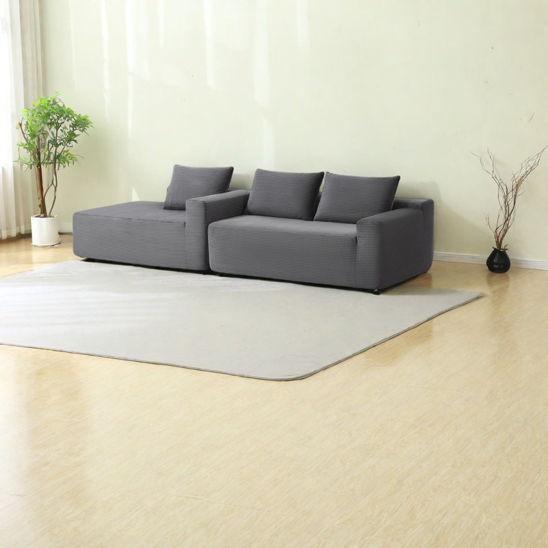 Canapé modulaire moderne gris avec sièges profonds pour la famille