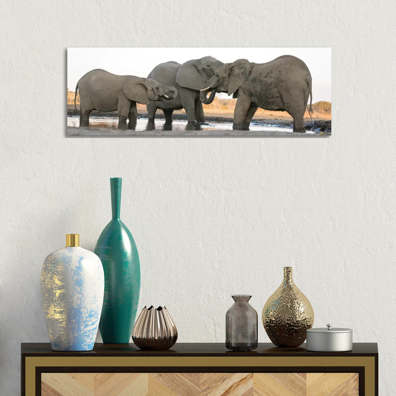Africa, Botswana, Senyati Safari Camp. Elephants At Waterhole by Jaynes Gallery - Wrapped Canvas Panoramic Print