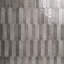 Gray picket-shaped ceramic wall tile with a glossy finish and varied charcoal shading.