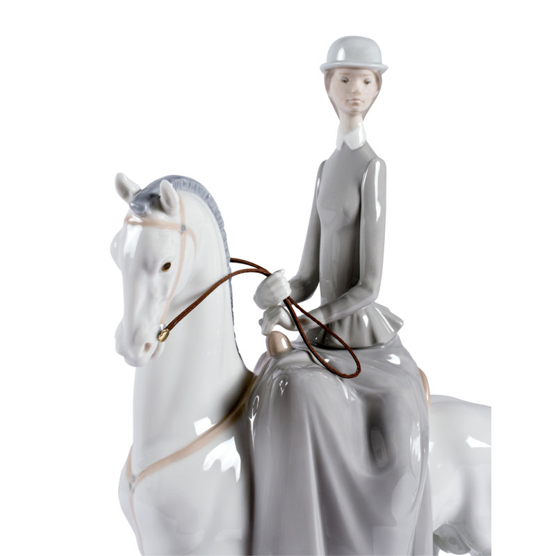 Woman on Horse Figurine