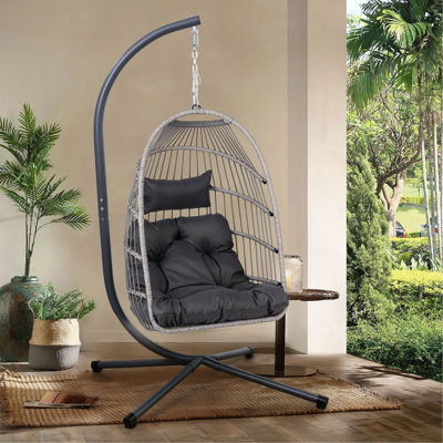 Fauteuil suspendu d'extérieur avec support et chaise pivotante en osier
