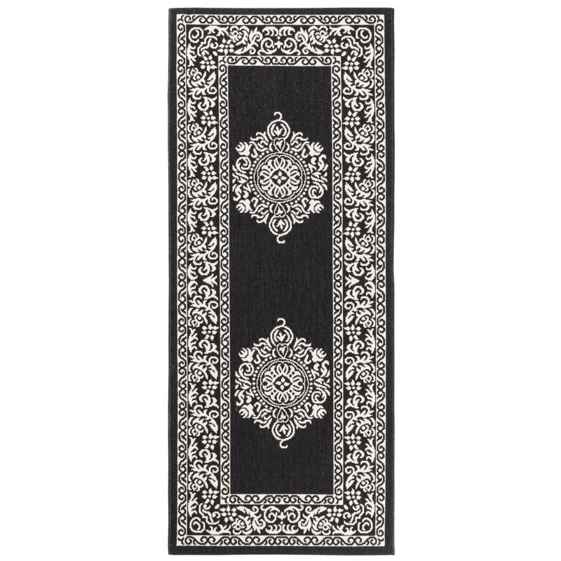 Magnifique tapis intérieur / extérieur noir Ramos, Rectangle 2 pi 7 po x 6 pi 6 po