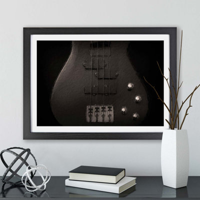 Bottom of a Black Bass Guitar - Framed Print