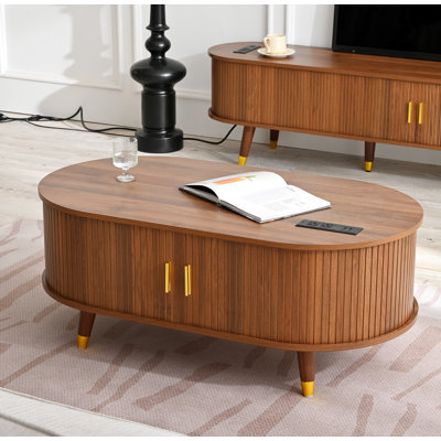 Table basse avec station de charge, porte de tambour coulissante et rangement