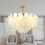 Lustre doré à 8 lumières avec plume en cristal Mickle