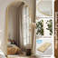 Miroir surdimensionné arqué en métal surdimensionné-570231696-570093163