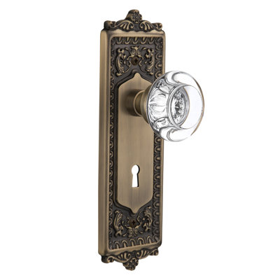 Egg & Dart Plate avec trou de serrure décoratif et poignée de porte ronde en cristal transparent