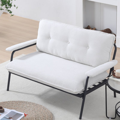 Canapé confortable et polyvalent pour les petits espaces, idéal pour diverses activités, de regarder un film à travailler