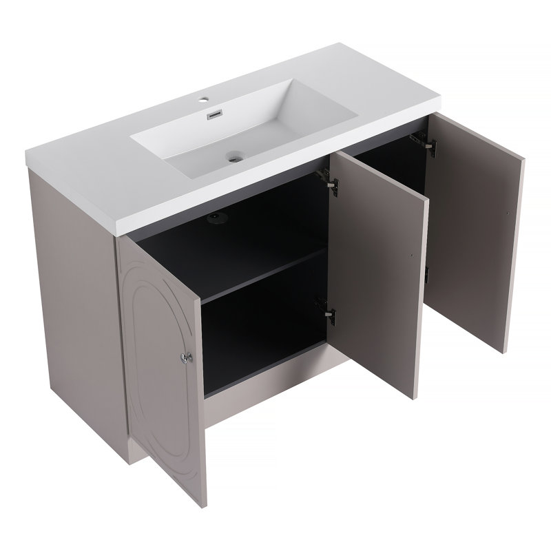 Freestanding Bathroom Vanity with Resin Sink and Soft-Close Cabinet Doors, Offering Adjustable Shelves and Customizable Handles for a Modern Bathroom