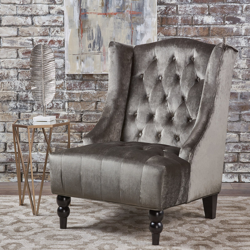 Fauteuil club Tesy, dossier haut, velours capitonné gris, pieds en bois noir