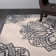 Vondrus Floral Beige Area Rug