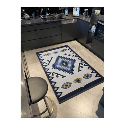 Tapis décoratif bleu traditionnel lavable à la machine