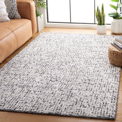 Tapis ivoire / noir en laine et coton touffetés à la main Glamour