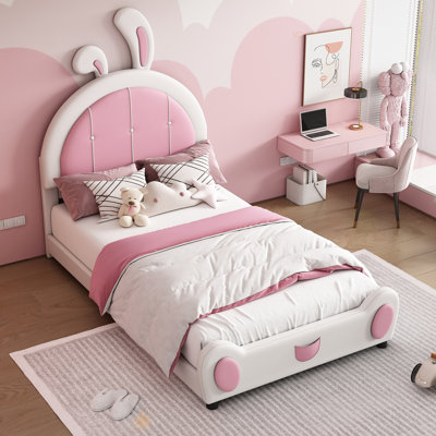Lit plateforme tapissier avec tête de lit en forme de lapin