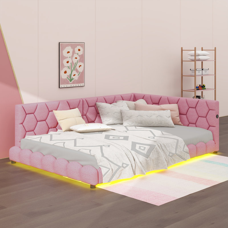 A Fully Upholstered Platform Bed In Full Size, Equipped With USB Ports And An LED Strip, Pink