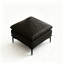 Repose-pieds en cuir noir avec repose-pieds