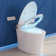 Smart Toilet with Quiet-Closed Heated Seat Sensor Auto, Foot Kick/Off-seat/Blackout/Remote Flush, Bidet Elongated Toilet with Tankless, Gentle Night light, Remote Control, Advanced