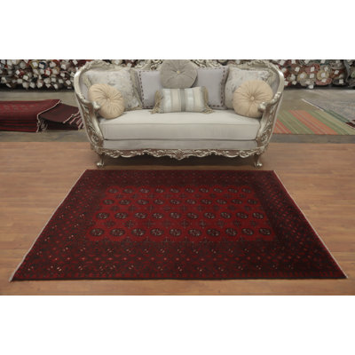 Tapis oriental rouge éléphant avec pied éléphant 5 x 6