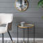 Ensemble de 2 tables d'appoint en fer doré et noir avec plateau en verre