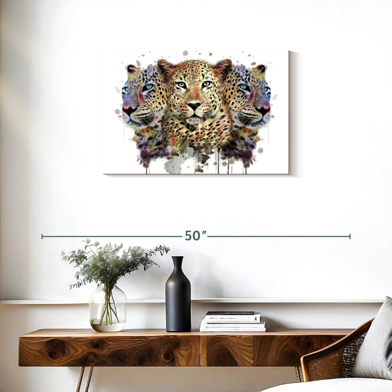Three Leopard Heads, 20" H x 30" W