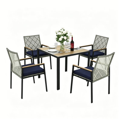 Ensemble de salle à manger d'extérieur 5 pièces, table en bois d'acacia avec trou pour parasol et chaises en osier avec coussins pour le jardin