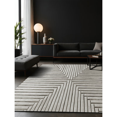 Tapis gris soyeux et moelleux