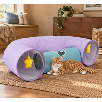 Ce grand tube violet pour chat d'intérieur est doté d'une structure pliable et résistante, d'un trou d'observation, de jouets suspendus et d'une doublure en papier froissé. Il convient aux chats, chatons, chiots et lapins.