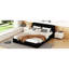 Grand lit plateforme tapissier en noir - construction fiable pour une nuit de repos-384606772