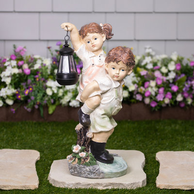 LED Solar Lighted Boy And Girl With Lantern Outdoor Garden Statue - 19.5"