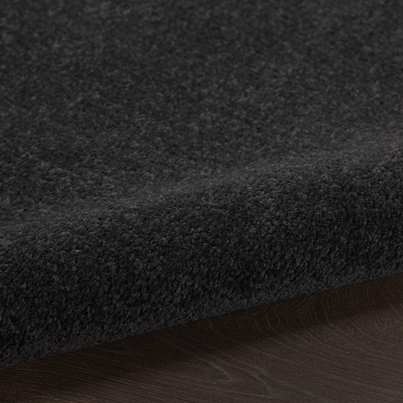 Tapis intérieur / extérieur noir uni en polypropylène tissé à la machine 8 pi x 10 pi
