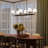 Rigsby Six-Light Matte Black with Brushed Gold Accents Linear Chandelier-127380318