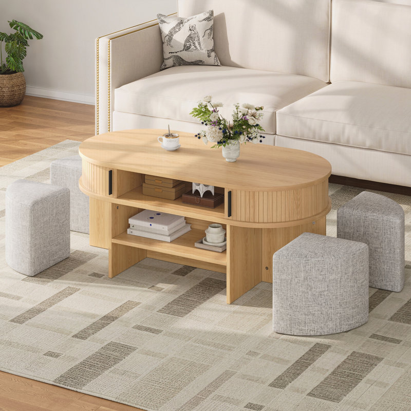 Table basse multifonctionnelle ovale avec rangement et 4 tabourets en tissu