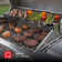 Nexgrill 4 - Burner Freestanding Propane Gas Grill with Side Burner and Cabinet