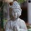 Figurine de Bouddha en prière