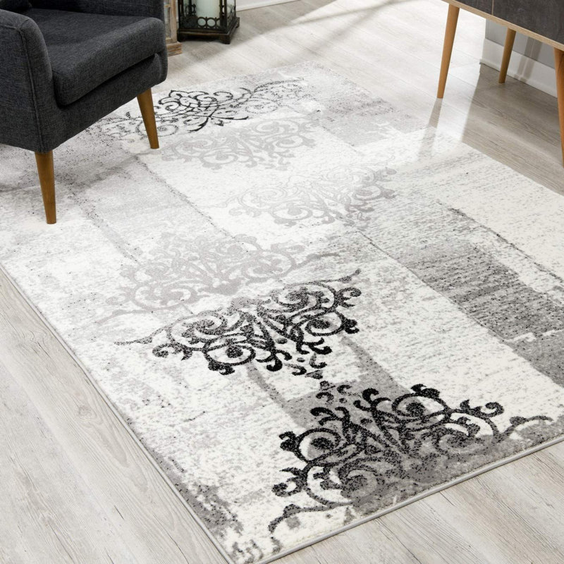 Tapis gris en polypropylène tissé à la machine Yanelys