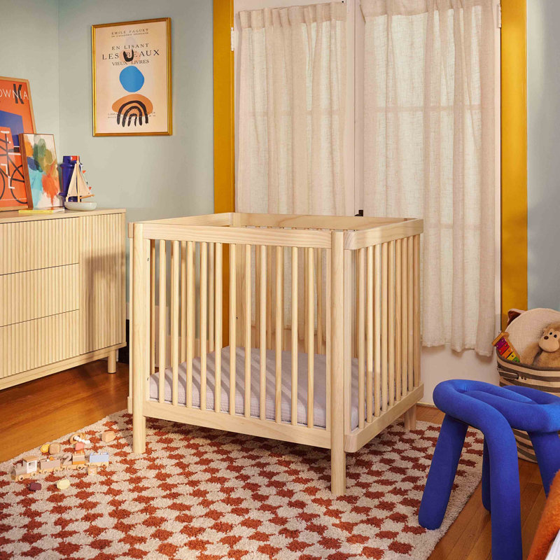 Blonde Pine Wood Convertible Crib with Rounded Spindles