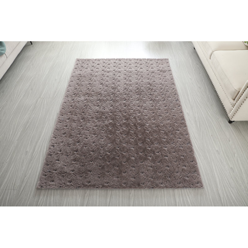Tapis gris abstrait à poils longs